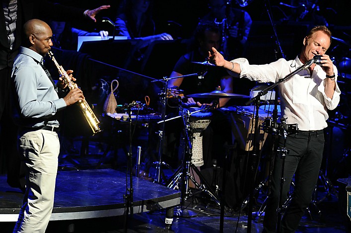 NEW YORK - JULY 13: Branford Marsalis (L) and Sting perform during his "Symphonicity" Tour, featuring the Royal Philharmonic Concert Orchestra at The Metropolitan Opera House on July 13, 2010 in New York City. (Photo by Theo Wargo/WireImage)